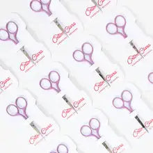 Embroidery Scissors Lilac with reusable bobbin packaging.